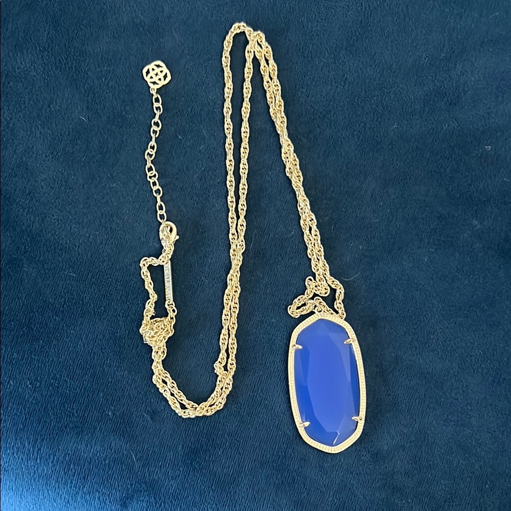 Elegant Gold Necklace with Blue Pendant